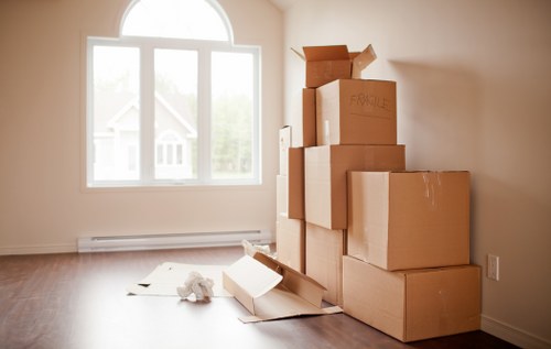 Packing and loading household items into a removals van