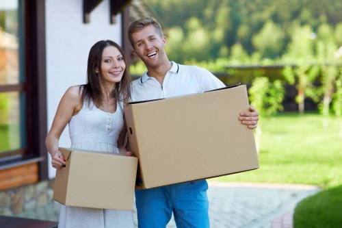 Moving team planning a removal van service in West Wimbledon