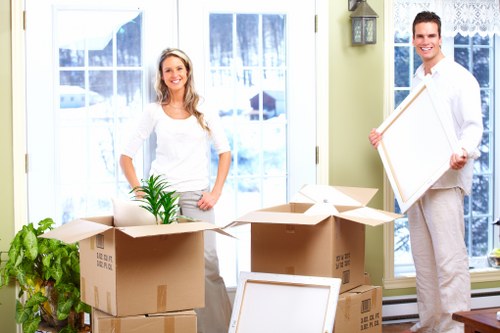Furniture and boxes being loaded for transport in Westwimbledon