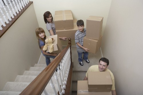 Packed boxes and furniture ready for moving van transport in Westwimbledon